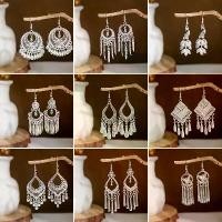 ราคา ต่างหูเงิน Miao เลียนแบบ สไตล์ชาติพันธุ์ ต่างหูพู่ระฆังนกยูง ต่างหูใบกลวง ถั่วน่ารัก ขายส่ง titanium earrings (1731205318597774280)