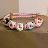 ราคา สร้อยข้อมือเชือกหนังสีชมพู สไตล์สวนหินสำหรับผู้หญิง หรูหราราคาไม่แพง ดีไซน์เฉพาะ โดนัทหลากสีประณีต สร้อยข้อมือ DIY (1731977268427916989)