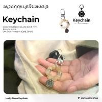 ราคา KEYCHAIN พวงกุญแจหินมงคล หินไหมทอง ขนาด 8 มม. ประดับด้วยจี้เหรียญโอม by siamonlineshop (1730749520884631797)