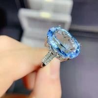 ราคา แหวนพลอยบลูโทพาสแท้สีฟ้ารูปไข่เม็ดใหญ่น้ำงามบ่าแหวนฝังพลอยไวท์โทพาสทรงBaguette (1732403004693447841)