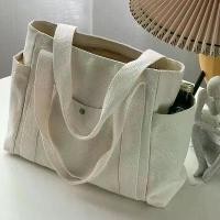 ราคา กระเป๋าโท้ทผ้าแคนวาส ความจุมาก กระเป๋าสะพายไหล่มีสไตล์ เหมาะสำหรับทำงานและออกไปข้างนอก อเนกประสงค์ คุณภาพสูง เหมาะสำหรับนักเรียนและการเดินทาง ถุง กระดาษ ari (1731771388794930221)