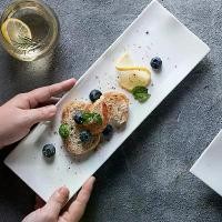 ราคา เครื่องใช้บนโต๊ะอาหารกำเนิดเซรามิก, สีขาวบริสุทธิ์ที่กำหนดเอง, จานสไตล์ญี่ปุ่นอันยาวสร้างสรรค์, จานซูชิ, จานขนมสี่เหลี่ยม, จาน BBQ (1732473957201773716)