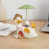 ราคา ของตกแต่ง DIY งานฝีมือ ของตกแต่งร่มเป็ด โมเดล จำลอง รูปปั้นเป็ดถือร่ม จอแสดงผล ของสะสม ประติมากรรมสัตว์เรซินการ์ตูน ของขวัญวันเกิดสำหรับเด็ก (1733456288899171545)