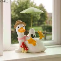 ราคา XINELU ของตกแต่ง DIY งานฝีมือ ของตกแต่งร่มเป็ด โมเดล ของสะสม รูปปั้นเป็ดถือร่ม จำลอง จอแสดงผล ประติมากรรมสัตว์เรซินการ์ตูน ตกแต่งเทศกาล (1733205665675118070)