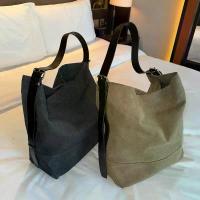 ราคา กระเป๋าถือสไตล์ลำลอง ความจุขนาดใหญ่ กระเป๋าผ้าแคนวาส หนังแท้ กระเป๋าผู้หญิง สะพายข้าง สองโทน กระเป๋าถือขนาดใหญ่ (1733380626792482148)