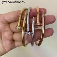 ราคา พร้อมส่งไม่ลอก ไม่ดำกำไลสแตนเลส แท้ กำไล ทรงตะปู (1734194612722501263)