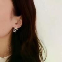 ราคา Light gold CD star stud earrings for women, decorated with a five-pointed star and pearl earrings. (1733480427161683801)