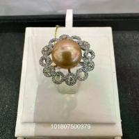 ราคา แหวนมุกสีทอง (Golden Pearl) เม็ดใหญ่ ทรงกลมล้อมรอบเพชรรูปวงกลมซ้อน (1733866699864049518)