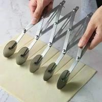 ราคา มีดตัดแป้งสแตนเลส 5 ล้อ สำหรับตัดแป้ง เกี๊ยว แป้งพัสดุ มีดกลิ้งสำหรับตัดแผ่นเกี๊ยว พาย พิซซ่า คุกกี้ แบบหลายรูปแบบ (1733508656694985784)