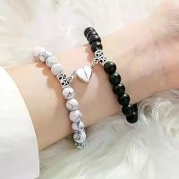 ราคา สร้อยข้อมือคู่ ดีไซน์หัวใจถึงหัวใจ หินสีดำและสีขาว สำหรับผู้หญิง ดีไซน์สวย ชุดสร้อยข้อมือยืดแม่เหล็ก 1 คู่ ส ร ้ อ ย ค ู ่ ก ั บ แ ฟ น สร้อย ข้อ มือ อิตาลี (1732177843572804590)
