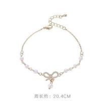ราคา สร้อยข้อมือมุก จี้รูปโบว์ประดับเพชร กำไลข้อมือ สร้อยข้อมือไข่มุก เครื่องประดับผู้หญิง แฟชั่น สไตล์เกาหลี B22 (14144603687)
