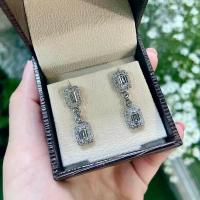 ราคา Titapa jewelry ต่างหูเพชรเอมเมอรัลล้อมเพชรน้ำ100แบบแป้นตุ้งติ้ง ดีไซน์สวยมากมาใหม่ เพชรขาวใสวิ้งๆน้ำ100คัดทุกเม็ดเหลี่ยมH Aน้ำลึกสวยเล่นไฟระยิบระยับงานปราณีตละเอียดตัวเรือนมีน้ำหนักแข็งแรงใส่ได้ทุกวัน