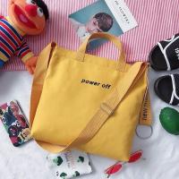 ราคา ราคาพิเศษ กระเป๋าแฟชั่น กระเป๋าสะพาย กระเป๋าเคียง ผ้าแคนวาส ขนาดใหญ่ จุของได้เยอะ ปักลายตัวอักษร กระเป๋าผ้าเท่ๆ งานสวย (20190610500)