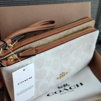 ราคา Sk Ocean กระเป๋าสตางค์โค้ชแท้ทูโทน เอ้าเลทแบบ 2 ซิป 7 5 นิ้ว มีสายคล้องมือ สีขาวครีมหลังสีน้ำตาล (20279770827)