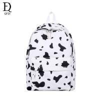 ราคา QFDI ใหม่ลายวัวกระเป๋าเป้ผ้าใบกระเป๋านักเรียนน่ารักจุดสีดำสีตัดกันกระเป๋าเป้นักเรียน (13996474546)