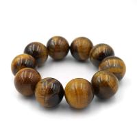 ราคา ไทเกอร์อาย พลอยตาเสือ พลังแห่งดวงตาที่สาม สร้อยข้อมือหินแท้ ขนาด 20 มม tigers eye by siamonlineshop (1112376403)