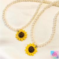 ราคา สร้อยลูกปัดมุขล้วน จี้ดินปั้น ดอกทานตะวัน (18867760606)