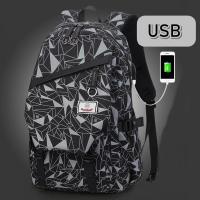 ราคา กระเป๋าโน๊ตบุ๊ค กระเป๋าเป้เดินทางมี USB ชาร์จ Power Bank ได้ ความจุ 45 ลิตร กราฟฟิคเทา ดำ 088 (186608457)