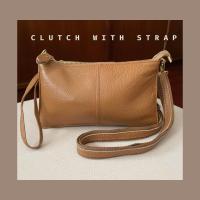 ราคา กระเป๋าคลัทช์หนังแท้สีดำแถมสายผ้าสะพายยาว (20616388117)