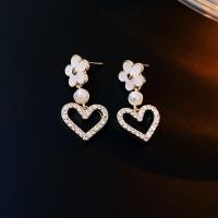 ราคา ต่างหูฝรั่งเศสเข็มเงินชุบทองจริงดอกไม้เพทายลายฉลุต่างหูหัวใจแฟชั่นสง่างามต่างหูหรูแสง (18594626148)