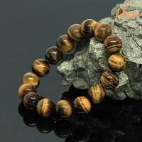 ราคา หินไทเกอร์อาย พลอยตาเสือ ขนาด 12 มิล Tiger Eye กำไลหินแท้ หินสี กำไล หิน หินสีน้ำตาล by ออมทอง (15564589763)