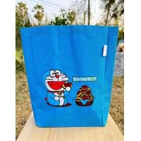 ราคา กระเป๋าถือใส่ A4 กระเป๋าถือคละลายโดเรม่อน มี 4 ลาย ขนาด ส30 กว้าง21 5 ฐ6 cm (17486963861)