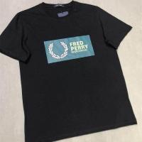ราคา FRED PERRY เสื้อยืดแขนสั้นคู่ชายและหญิงคอกลมหูข้าวสาลีบริสุทธิ์เสื้อยืดพิมพ์ลายปักหลวมสีทึบขนาดใหญ่ (18044744337)