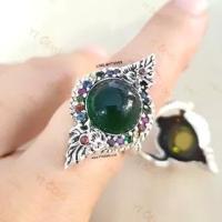 ราคา แหวนบ่วงนาคบาศ โอบมณีสีเขียว มรกต CZ ล้อมนพเก้า CZ แหวนเงินแท้ รมดำ YTG 11479 (11684856636)