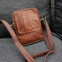 ราคา กระเป๋าสพาย หนังแท้ทั้งใบ งานดี ช่องใส่ของเยอะ ทนทานใช้ได้นานเป็น 10ปี แบรนด์แท้ STAFF 100 สายปรับสั้นยาวได้ (20986647944)