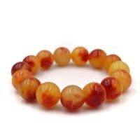 ราคา LUCKYSTONE หินสีนำโชค สร้อยข้อมือหินแท้ โทนสีเหลืองส้ม เลือกขนาดเม็ดหินได้ 10 12 มม by siamonlineshop (17326834437)