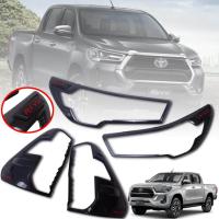 ราคา ครอบไฟหน้า ครอบไฟท้าย รุ่น โตโยต้า ไฮลักซ์ รีโว่ ร็อคโค่ TOYOTA HILUX REVO ROCCO ปี 2020 2021 ลายเคฟล่า โลโก้แดง 4 ชิ้น (3741198957)