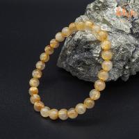 ราคา หินไหมทอง ขนาด 6 มิล Gold Rutilated Quartz กำไลหินมงคล เสริมความมั่งคั่งร่ำรวย กำไลหินแท้ หินมงคล หินสีทอง by ออมทอง (15992688402)