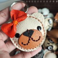 ราคา พวงกุญแจหนังแท้ หมีผูกโบว์ ใช้ห้อยกุญแจรถยนต์ พวงกุญแจตุ๊กตา พวงกุญแจ diy น่ารัก เหมาะสำหรับเป็นของชำร่วย (19784026195)