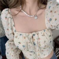 ราคา COD Cicishop 355 เสื้อครอปปาดไหล่แขนยาวใส่แขนตกก็ได้มีแขนก็ดี แต่งจั้มแขน เข้ารูปสะดุดตา ลายดอกผูกเชือกอก ปังสุด (19726114241)