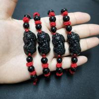 ราคา ข้อมือด้ายแดงสลับลูกปัด คั่นปี่เซียะสีดำ (17699447372)