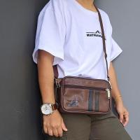 ราคา กระเป๋าสะพาย คล้องเข็มขัดได้ มีสายสะพายสามารถสะพายได้หลายรูปแบบ หนังPU สายปรับสั้นยาวได้ แบรนด์แท้ WOLVES ORIGINAL (20627554755)