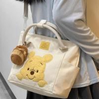 ราคา ตัวการ์ตูนน่ารักจากดิสนีย์วินนี่กระเป๋าสะพายพาดลำตัวผ้าใบหมีพูห์จี้โถน้ำผึ้งตุ๊กตาพกพาได้สะพายข้างกระเป๋าใช้งานได้สองแบบ (20944236077)