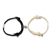 ราคา กำไลข้อมือแม่เหล็กรูปหัวใจสำหรับผู้ชายและผู้หญิงกำไลข้อมือคู่รักปรับเชือกได้สีดำสีขาว (20485886502)