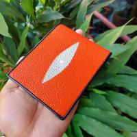 ราคา กระเป๋าปลากระเบน สีส้ม กระเป๋าสตางค์หนังปลากระเบน มากับมุขขาวตรงกลาง กระเป๋าหนังแท้ มีช่องเสียบบัตร หรือบิล ข้างหลังได้ (16699247248)