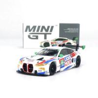 ราคา MINI GT 1 64 Nissan Skyline GT R R34 V Spec II ลายพรางดิจิตอลสีม่วง5ครบรอบปีโมเดล RHD MGT00446 R รถแข่งของเล่น (20953403985)