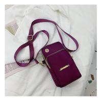 ราคา กระเป๋าใส่โทรศัพท์มือถือสีล้วนกระเป๋าสะพายข้างแนวตั้งสำหรับผู้หญิงกระเป๋าใบเล็กสะพายไหล่ผ้าไนลอนผ้าอ๊อกฟอร์ดกันน้ำกระเป๋าใส่เหรียญมีซิปสไตล์ญี่ปุ่นและเกาหลี (21275647671)