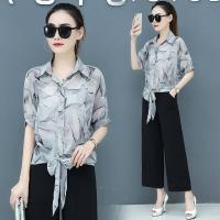 ราคา เสื้อเชิ้ตผ้าชีฟองของผู้หญิงเดรสผ้าชีฟองแขนสั้นทรงค้างคาวเวอร์ชันเกาหลีรุ่นใหม่ฤดูร้อนปี2022 (12801312740)