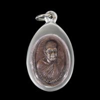 ราคา เหรียญหลวงพ่อวัดดอนตัน รุ่น งาช้างดำ บล็อก งาใหญ่ ปี พ ศ 2518 เนื้อชิน จี้พระ เลี่ยมกรอบสแตนเลสแท้ 100 (10806642442)