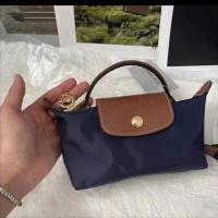 ราคา Longchamp bag mini dumpling bag genuine leather womens bag new hand held mobile phone bag mini hand held cross body cosmetic bag (20448903504)