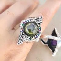 ราคา แหวนบ่วงนาคบาศ โอบมณีสีเขียวส่อง CZ ล้อมนพเก้า CZ แหวนเงินแท้ รมดำ YTG 11485 (11684281545)