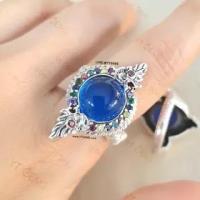 ราคา แหวนบ่วงนาคบาศ โอบมณีสีฟ้า เพทาย CZ ล้อมนพเก้า CZ แหวนเงินแท้ รมดำ YTG 11482 (11684751328)