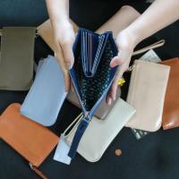 ราคา ARC wallet กระเป๋าสตางค์หนังแท้คล้องมือ สีเหลือง THEOREM (518898684)