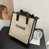 ราคา 2023 NEW for European and American style fashion portable canvas bag large capacity letter portable hand carrying Mommy bag small fragrance style simple Tote Bag (20050817485)
