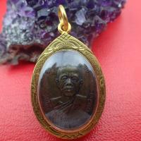 ราคา พระเครื่องหลวงพ่อคูณ วัดบ้านไร่เหรียญปี17เนื้อทองแดงรมดำพร้อมเลี่ยมทอ (17710405577)