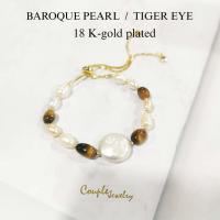 ราคา แฟชั่นข้อมือมุกบาร็อกแท้ หินไทเกอร์ อาย สายปรับรูดฟรีไซต์ ชุบทอง18Kสวยทนสวยนาน (18455343045)